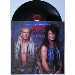 Mc AULEY SCHENKER GROUP - Time